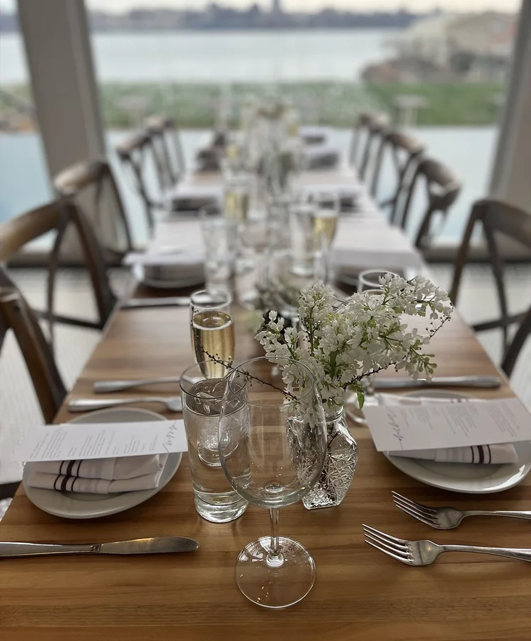Elegant table setting with flowers and glassware
